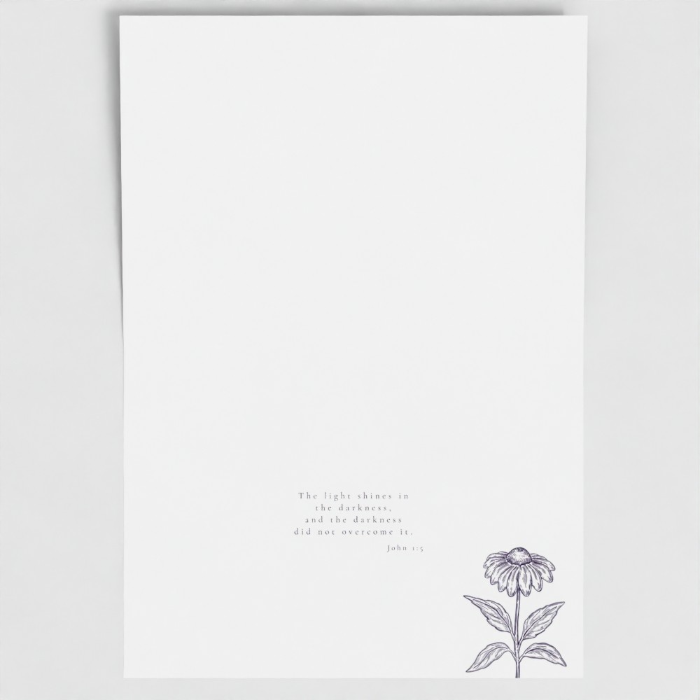 Inside of CONQUER card showing liturgical bible verse and botanical image.