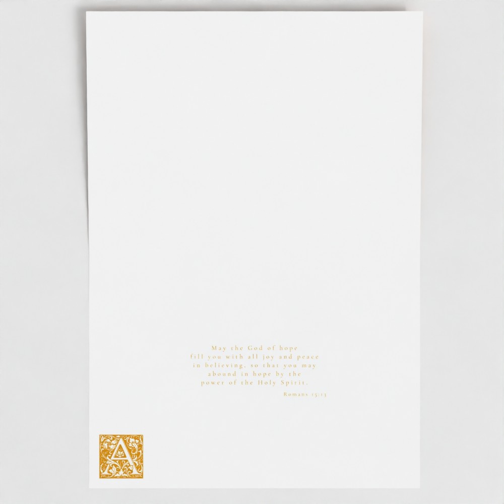 Inside of Aureole Gold Abound card showing liturgical bible verse and illuminated drop cap letter.