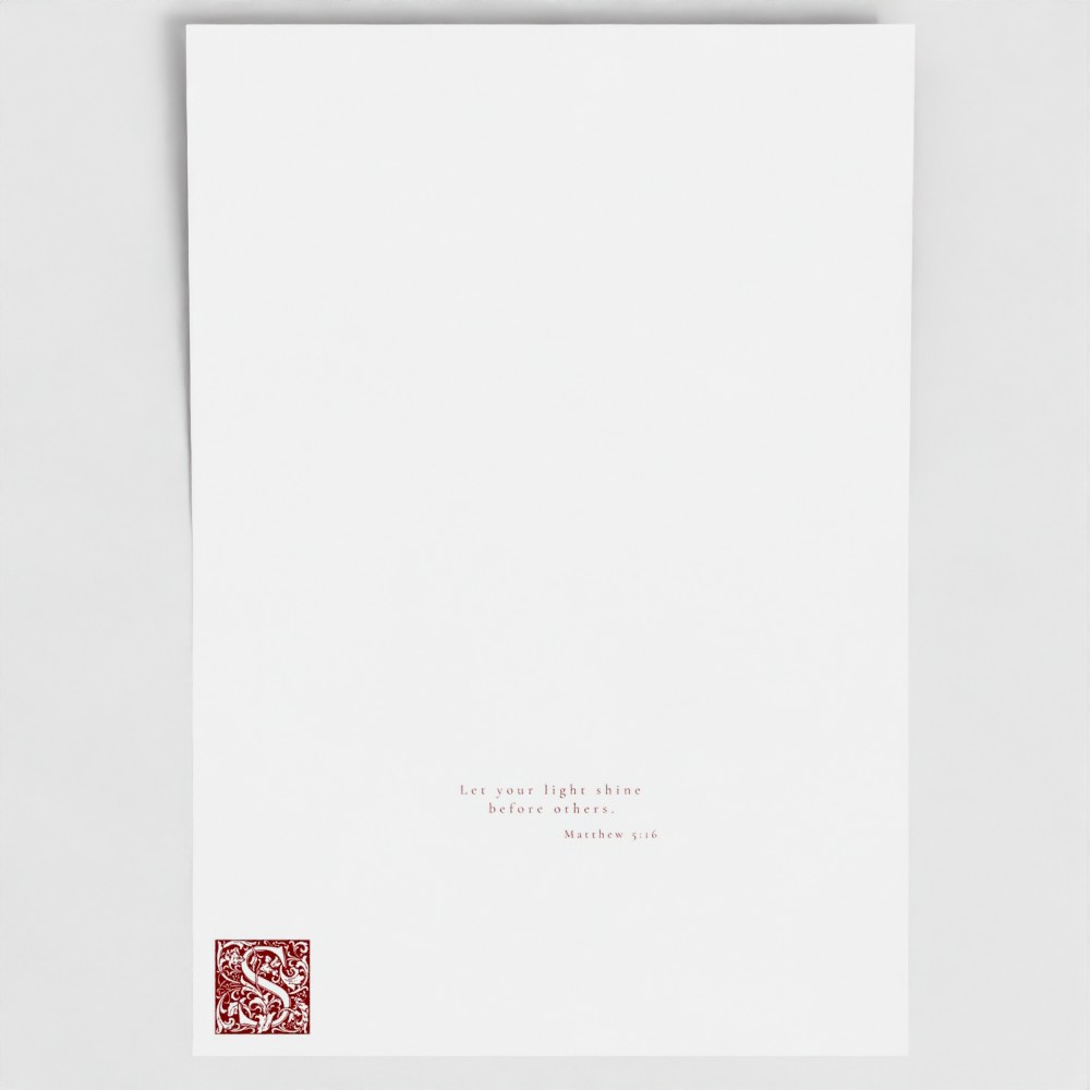 Inside of Cardinal Red Shine card showing liturgical bible verse and illuminated drop cap letter.