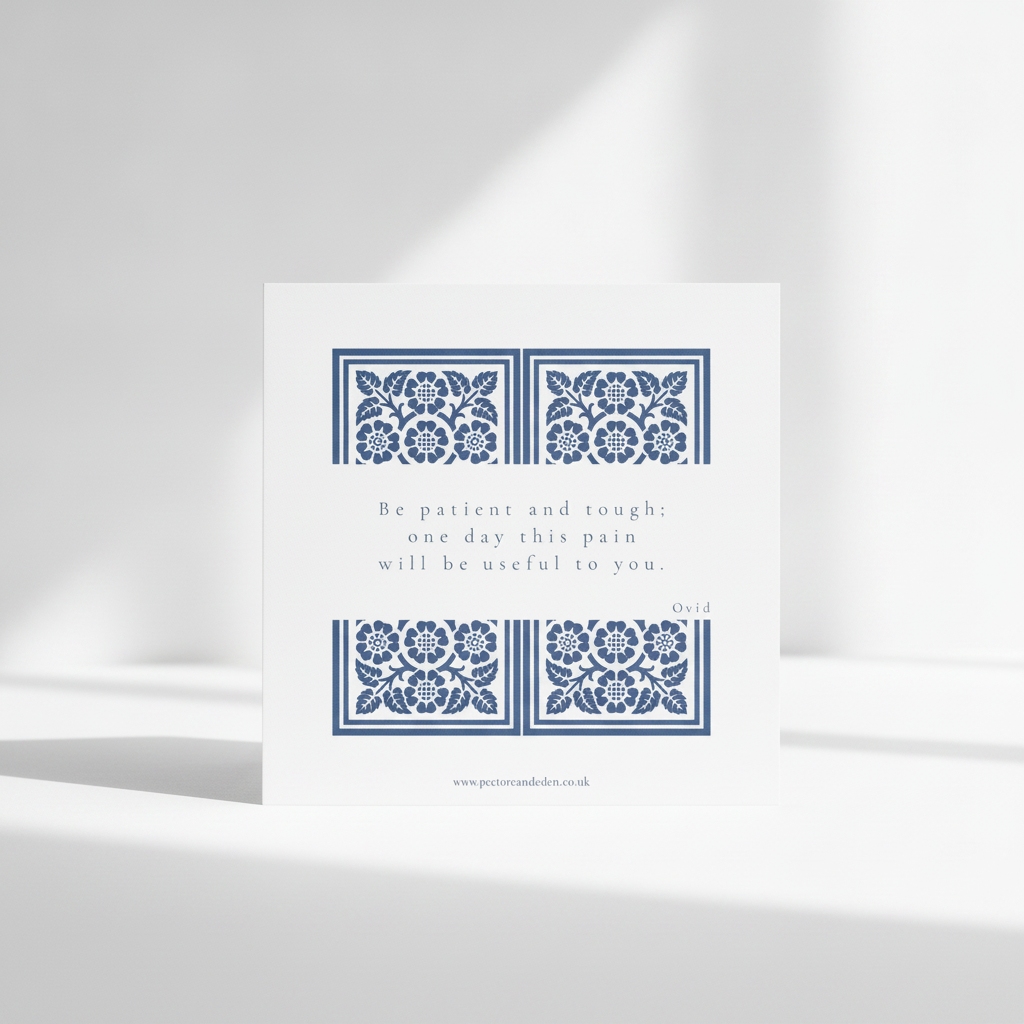 Modern minimalist typography layout on the back of the Luctor et Emergo art card displaying the quote Be patient and tough; one day this pain will be useful to you.