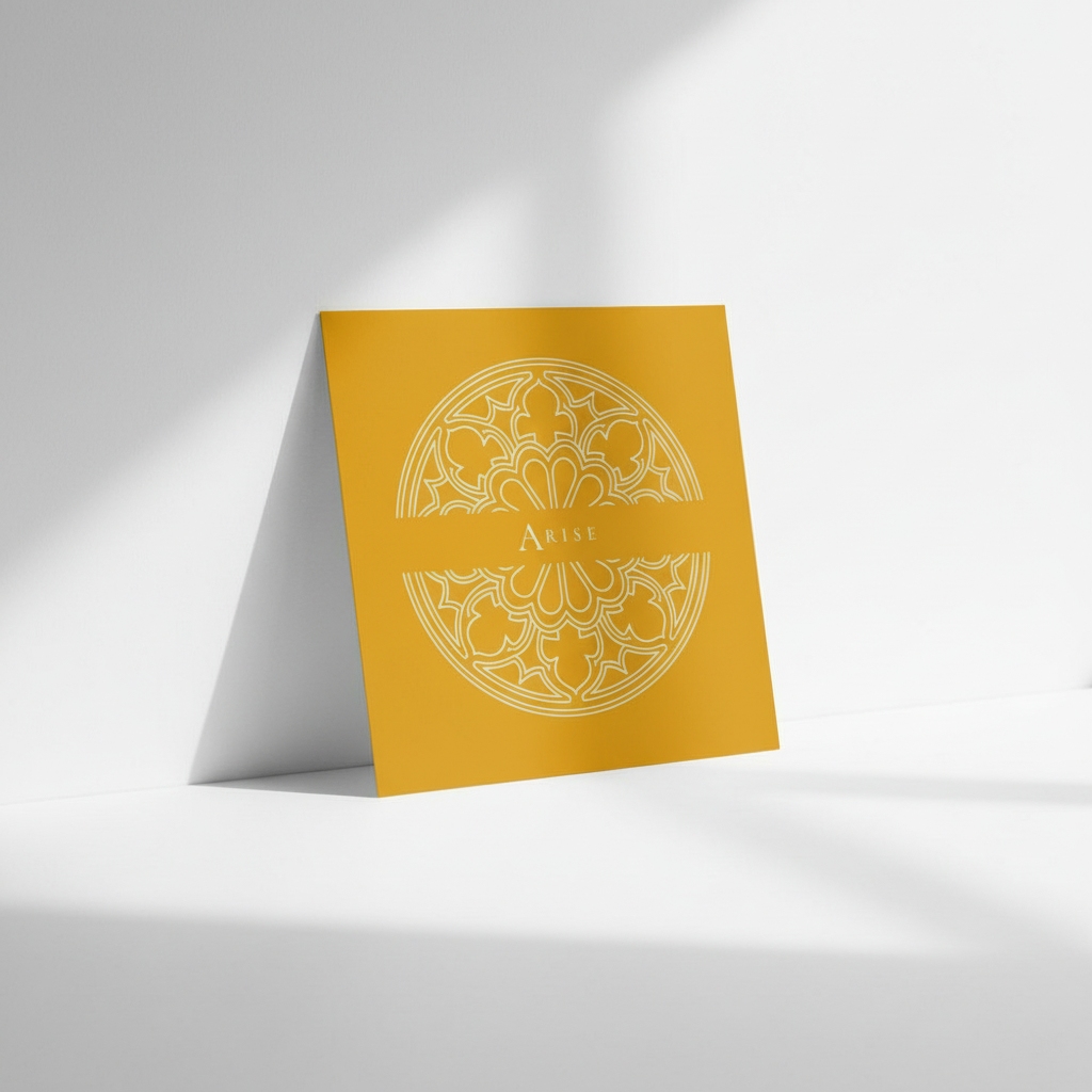 Yellow art card displaying a detailed Gothic rose window centred around the focus word Arise.