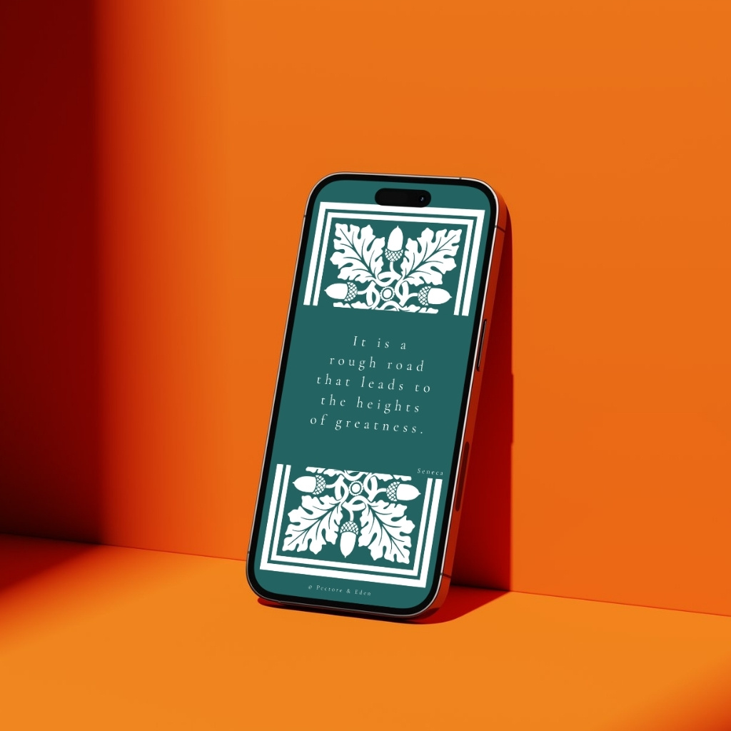 A modern smartphone displaying the Seneca quote 'It is a rough road...' from the Aut Inveniam Viam wallpaper on the lock screen.